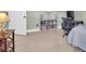 This bedroom has a bookshelf, computer table, a chair, and wood-look floors at 106 Gathering Island Rd, Summerville, SC 29485