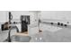 Spacious kitchen featuring granite countertops, stainless steel sink, and white cabinetry at 106 Gathering Island Rd, Summerville, SC 29485