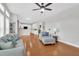 Spacious open-concept living room with hardwood floors and bright, airy feel at 106 Gathering Island Rd, Summerville, SC 29485