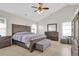 Large main bedroom with natural light, ceiling fan, and stylish furnishings at 106 Gathering Island Rd, Summerville, SC 29485