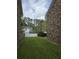 Spacious backyard featuring lush green grass and a privacy fence at 108 Sandlewood Dr, Summerville, SC 29483