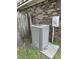 Exterior unit of air conditioner set next to brick wall of home at 108 Sandlewood Dr, Summerville, SC 29483
