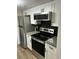 Contemporary kitchen featuring stainless steel appliances, granite counters, and black backsplash at 108 Sandlewood Dr, Summerville, SC 29483
