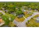 An aerial view displays the neighborhood and surrounding treescape at 1111 Kilarney Rd, Mount Pleasant, SC 29464