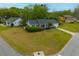 Aerial view of a home featuring green lawn, a residential setting, and mature trees at 1111 Kilarney Rd, Mount Pleasant, SC 29464