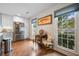 Bright eat-in kitchen area has hardwood floors, lots of windows, and stainless steel appliances at 1111 Kilarney Rd, Mount Pleasant, SC 29464