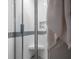 An accessible shower has a glass enclosure, built-in seat, and convenient shelving for toiletries at 1111 Kilarney Rd, Mount Pleasant, SC 29464