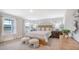 Bright bedroom with large windows, light-colored walls, and stylish furnishings, offering a comfortable and inviting atmosphere at 112 Coastline St, Ridgeville, SC 29472