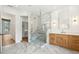 Bright bathroom with walk-in shower, closet and wood vanity at 116 Peninsula Dr, Ravenel, SC 29470