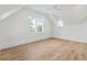 Bright bedroom with a ceiling fan, wooden floors, and several windows that bring in ample natural light at 116 Peninsula Dr, Ravenel, SC 29470