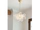 Unique bubble chandelier with gold chain, complemented by wood beams and white trim at 116 Peninsula Dr, Ravenel, SC 29470