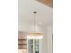 Elegant chandelier above a kitchen area, featuring a gold frame and translucent shade at 116 Peninsula Dr, Ravenel, SC 29470
