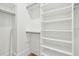 Spacious walk-in closet with custom shelving and ample storage space at 116 Peninsula Dr, Ravenel, SC 29470
