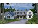 Beautiful exterior elevation of a grand modern farmhouse featuring a metal roof, timber beams, and detailed trim at 116 Peninsula Dr, Ravenel, SC 29470