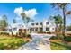 Stunning exterior of home with matching garage and a paved driveway at 116 Peninsula Dr, Ravenel, SC 29470