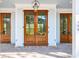 Beautiful entryway featuring wooden doors at 116 Peninsula Dr, Ravenel, SC 29470