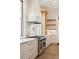 Gourmet kitchen featuring stainless steel appliances, marble backsplash, and custom cabinetry at 116 Peninsula Dr, Ravenel, SC 29470
