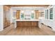 Luxurious kitchen boasts marble countertops, a large island, and premium cabinets at 116 Peninsula Dr, Ravenel, SC 29470
