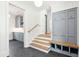 Inviting mudroom with a built-in bench and storage, conveniently located near the staircase at 116 Peninsula Dr, Ravenel, SC 29470