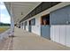Well-ventilated stables with individual stalls, providing comfort and safety for horses in a tidy environment at 116 Peninsula Dr, Ravenel, SC 29470
