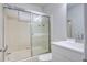 Bathroom featuring a bathtub with shower and sliding glass doors at 117 Lewisfield Dr, North Charleston, SC 29418