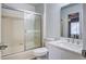 Cozy bathroom featuring a tiled shower and tub, vanity, and a mirror at 117 Lewisfield Dr, North Charleston, SC 29418
