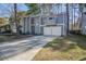 Charming home with a double-door garage and a long driveway at 117 Lewisfield Dr, North Charleston, SC 29418