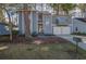 Charming two-story home with light-blue painted wood and double-door garage at 117 Lewisfield Dr, North Charleston, SC 29418