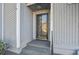 Inviting home entrance featuring a black-framed glass front door at 117 Lewisfield Dr, North Charleston, SC 29418