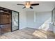 Sunroom featuring hardwood floors, a glass door, and windows at 117 Lewisfield Dr, North Charleston, SC 29418