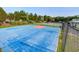 Blue basketball court with well-maintained facilities, great for sports enthusiasts and community fun at 123 Hyacinth St, Summerville, SC 29483
