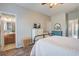 Bright bedroom with view of en-suite bathroom, featuring wood-look floors and a chest of drawers at 123 Hyacinth St, Summerville, SC 29483
