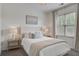 Cozy bedroom with plush carpeting, a comfortable bed, and bright natural light at 123 Hyacinth St, Summerville, SC 29483
