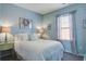 Inviting bedroom featuring bright light, coordinated decor, and a comfortable queen bed at 123 Hyacinth St, Summerville, SC 29483