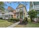 Charming two-story home with a welcoming front porch and colorful siding in a desirable neighborhood at 123 Hyacinth St, Summerville, SC 29483