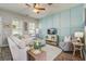 Cozy living room with stylish decor, comfortable seating, and a modern accent wall with natural light at 123 Hyacinth St, Summerville, SC 29483