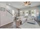 Bright and airy living room featuring a comfortable sofa and stylish decor with lots of natural light at 123 Hyacinth St, Summerville, SC 29483