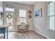 Bright office space with desk, windows, and stylish decor adjacent to the kitchen at 123 Hyacinth St, Summerville, SC 29483