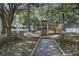 A nature-themed playground nestled amongst mature trees provides a fun and rustic recreational area at 123 Hyacinth St, Summerville, SC 29483