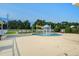 A fun splash pad provides a delightful water feature and seating for playful summer afternoons at 123 Hyacinth St, Summerville, SC 29483