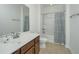 Well-lit bathroom featuring a shower-tub combo and a modern vanity with plenty of storage space at 1271 Dingle Rd, Mount Pleasant, SC 29466