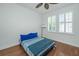 Cozy bedroom featuring hardwood floors, plantation shutters, and a contemporary ceiling fan at 1271 Dingle Rd, Mount Pleasant, SC 29466