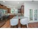Kitchen features stainless appliances, granite countertops, and an island with barstool seating at 1271 Dingle Rd, Mount Pleasant, SC 29466