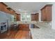 Modern kitchen with stainless steel appliances, granite countertops, and dark wood cabinetry at 1271 Dingle Rd, Mount Pleasant, SC 29466
