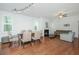 Bright open floorplan with hardwood floors, fireplace, dining area, and natural light at 1271 Dingle Rd, Mount Pleasant, SC 29466