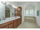 Bathroom features double sink vanity, soaking tub, and separate shower at 1271 Dingle Rd, Mount Pleasant, SC 29466