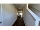 Modern entryway with dark wood floors, neutral walls, and stairs leading to the upper level at 135 Yarrow Way, Moncks Corner, SC 29461