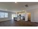 Bright living space with kitchen, island, and stainless steel appliances featuring sleek design at 135 Yarrow Way, Moncks Corner, SC 29461