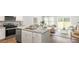 Open concept kitchen with stainless steel appliances, granite countertops, and a dining area at 137 Yarrow Way, Moncks Corner, SC 29461
