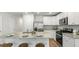 A well-equipped kitchen with stainless steel appliances, granite countertops, and a center island at 137 Yarrow Way, Moncks Corner, SC 29461